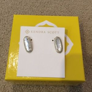 Kendra Scott earrings.